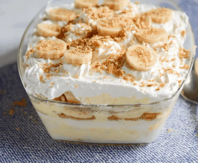 Delicious No-Bake Southern Banana Pudding layered with creamy vanilla pudding, fresh bananas, and whipped topping in a glass serving dish