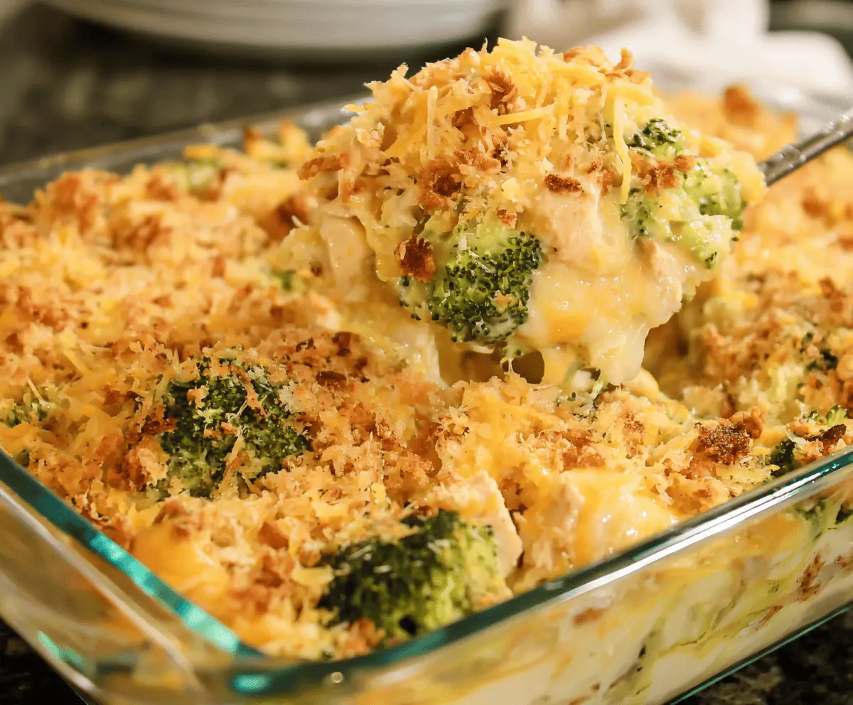 Delicious broccoli and chicken casserole with melted cheese and fresh herbs