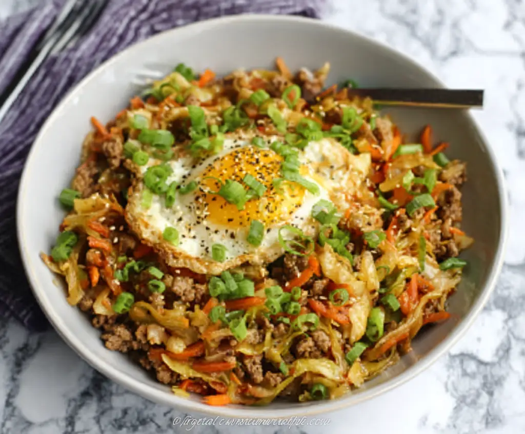 Delicious Egg Roll in a Bowl with fresh vegetables and savory pork in a bowl.