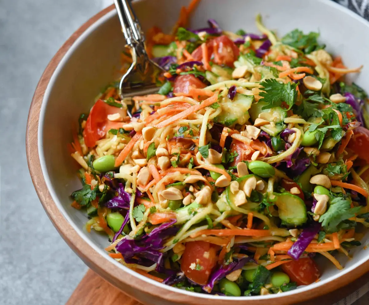 Fresh Spring Roll Salad with Peanut Sauce, featuring vibrant vegetables and crunchy spring rolls